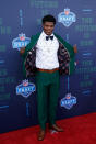 <p>Lamar Jackson of Louisville poses on the red carpet prior to the start of the 2018 NFL Draft at AT&T Stadium on April 26, 2018 in Arlington, Texas. (Photo by Tim Warner/Getty Images) </p>