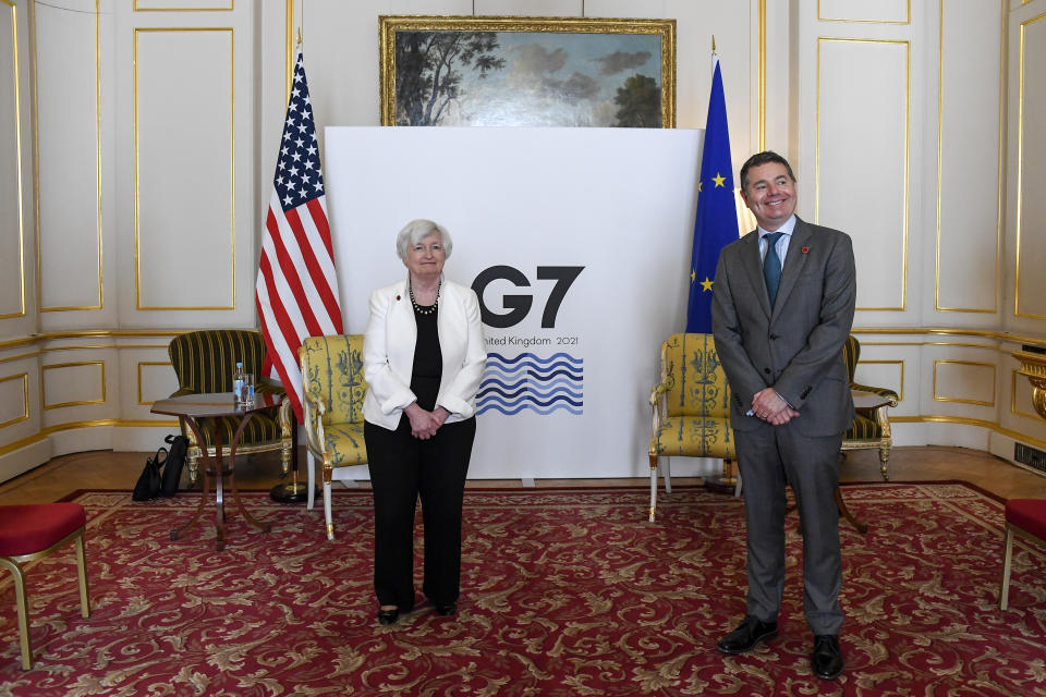 U.S. Treasury Secretary Janet Yellen, left, and Eurogroup President Paschal Donohoe pose for photos as finance ministers from across the G7 nations meet at Lancaster House in London, Saturday, June 5, 2021, ahead of the G7 leaders' summit. (AP Photo/Alberto Pezzali, Pool)