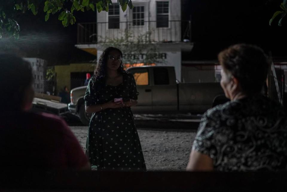 Claudia González visits with her neighbors in her Tamaulipas village. Her older brother was kidnapped from a nearby ranch in 2020 and is presumed dead. González and her neighbors say it’s common to hear gunfire at night.
