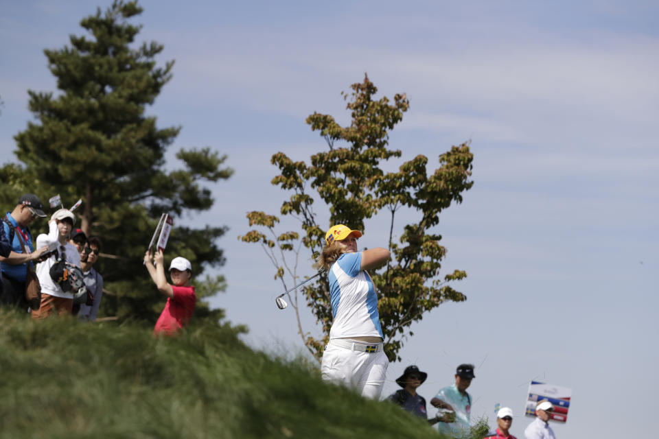 Caroline Hedwall of Sweden watches her shot during the first round of the UL International Crown golf tournament at the Jack Nicklaus Golf Club Korea, in Incheon, South Korea, Thursday, Oct. 4, 2018. (AP Photo/Lee Jin-man)