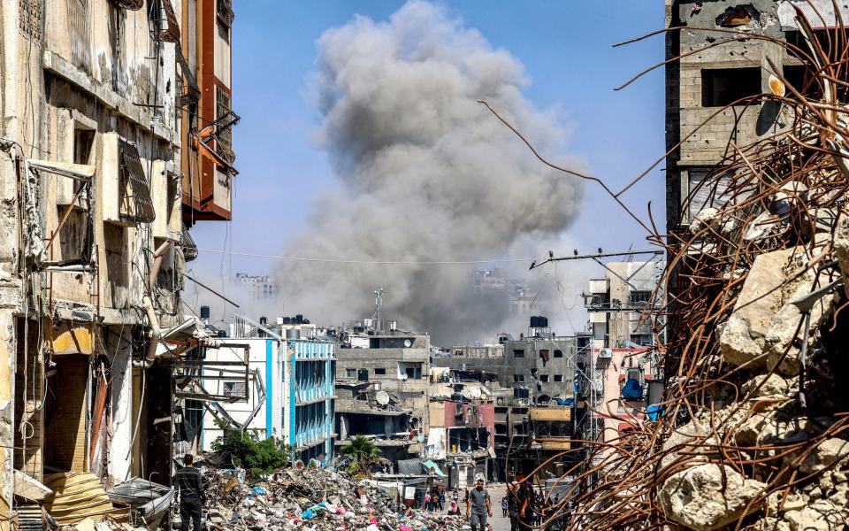 A smoke plume rises during Israeli bombardment in Jabaliya on Tuesday