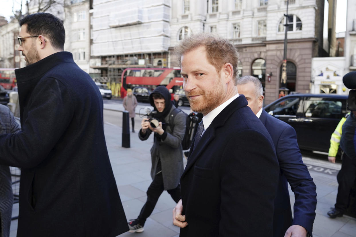 Prince Harry arrives at the Royal Courts Of Justice, in London, Monday, March 27, 2023. Prince Harry is in a London court as the lawyer for a group of British tabloids prepared to ask a judge to toss out lawsuits by the prince, Elton John and several other celebrities who allege phone tapping and other invasions of privacy. (Jordan Pettitt/PA via AP)