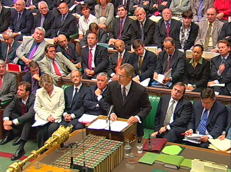 MPs and ministers listen as then prime minister Tony Blair addresses the House of Commons recalled from the summer recess for an all-day debate on Iraq, on 24 September 2002 (PA)