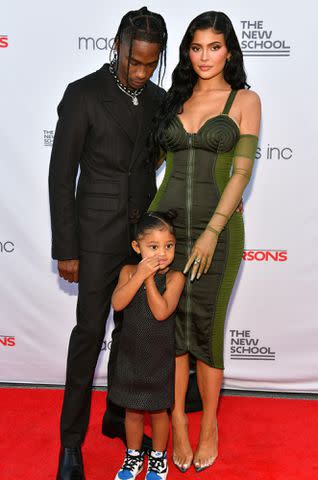 <p>Craig Barritt/Getty</p> Travis Scott and Kylie Jenner with their daughter Stormi Webster at the The 72nd Annual Parsons Benefit in June 2021.