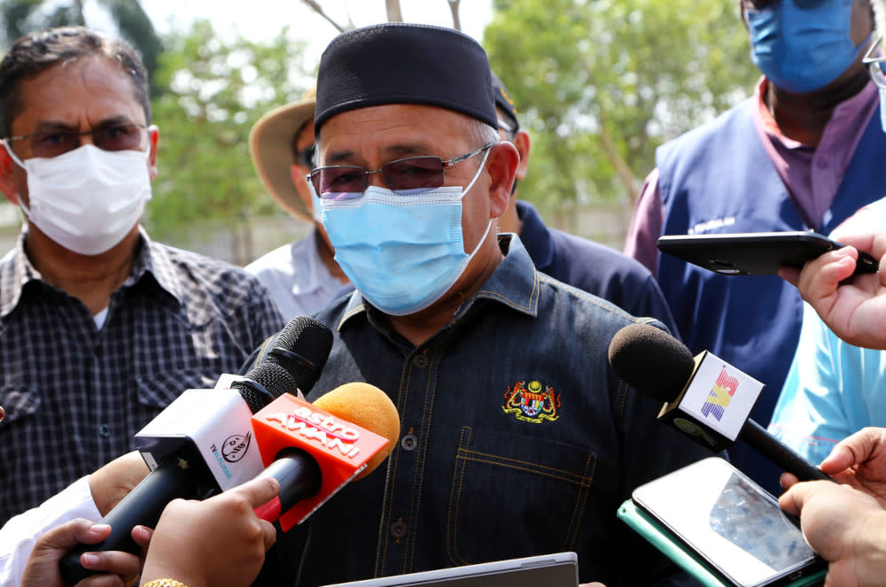 Environment and Water Minister Datuk Seri Tuan Ibrahim Tuan Man speaking to reporters during his visit to Sungai Kim Kim in Johor, March 9, 2021. — Bernama pic