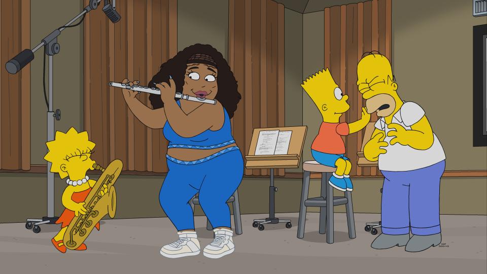 Lisa Simpson jams with Lizzo as Bart slaps Homer during "The Simpsons."