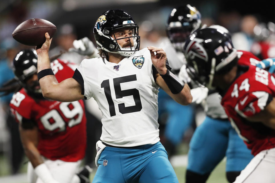 Jacksonville Jaguars quarterback Gardner Minshew II (15) works in the pocket against the Atlanta Falcons during the first half of an NFL football game, Sunday, Dec. 22, 2019, in Atlanta. (AP Photo/John Bazemore)