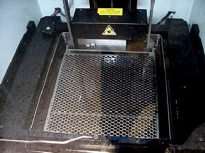 <b>The platform in the tank of photopolymer at the beginning of a print run.</b>