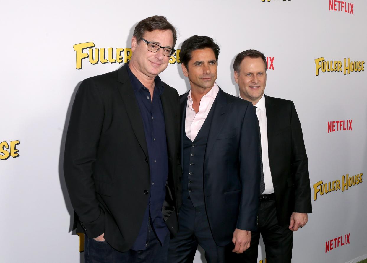 (L-R) Actors Bob Saget, John Stamos and Dave Coulier attend the premiere of Netflix's "Fuller House" at Pacific Theatres at The Grove on Feb. 16, 2016, in Los Angeles, Calif.