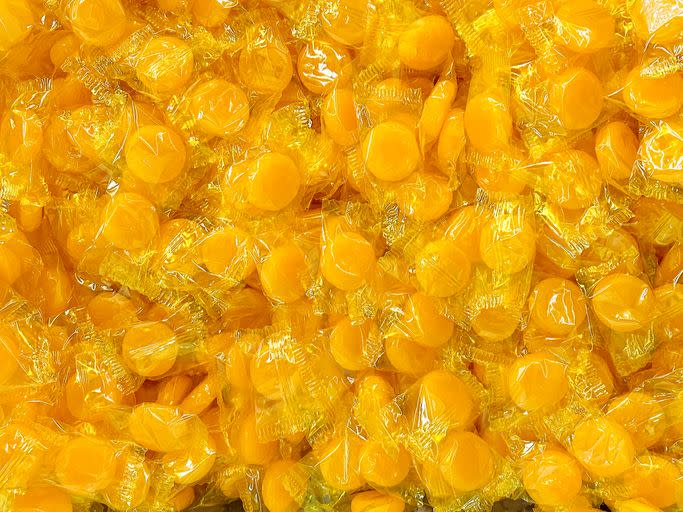 orange gold butterscotch candy pile display