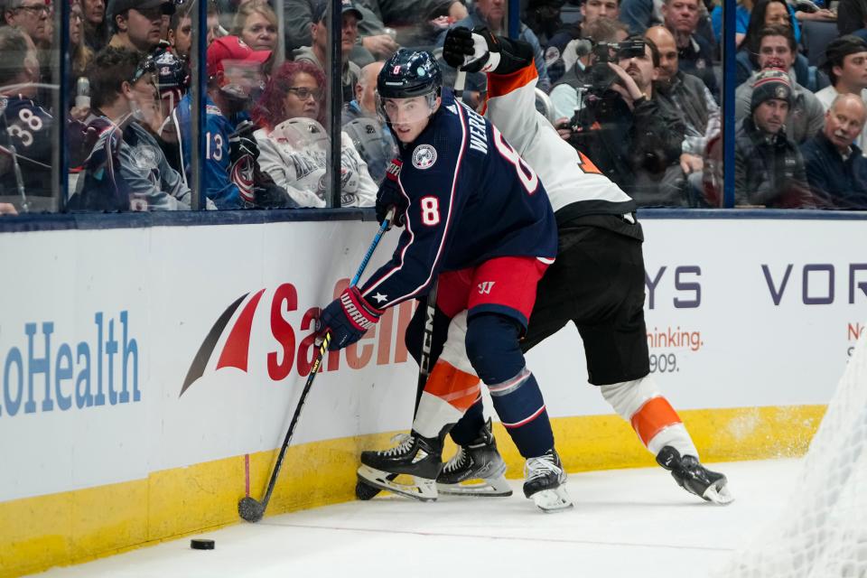 Oct 12, 2023; Columbus, Ohio, USA; Columbus Blue Jackets defenseman Zach Werenski (8) controls the puck during the second period of the NHL hockey game against the Philadelphia Flyers at Nationwide Arena.