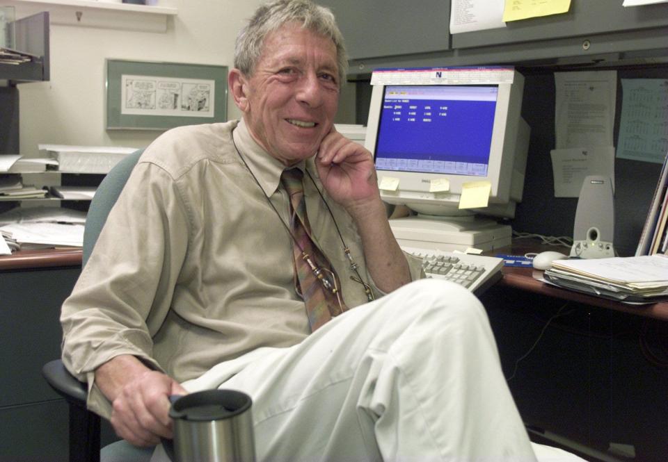 Home News Tribune editor Richard "Dick" Hughes in his office on Aug. 29, 2002.