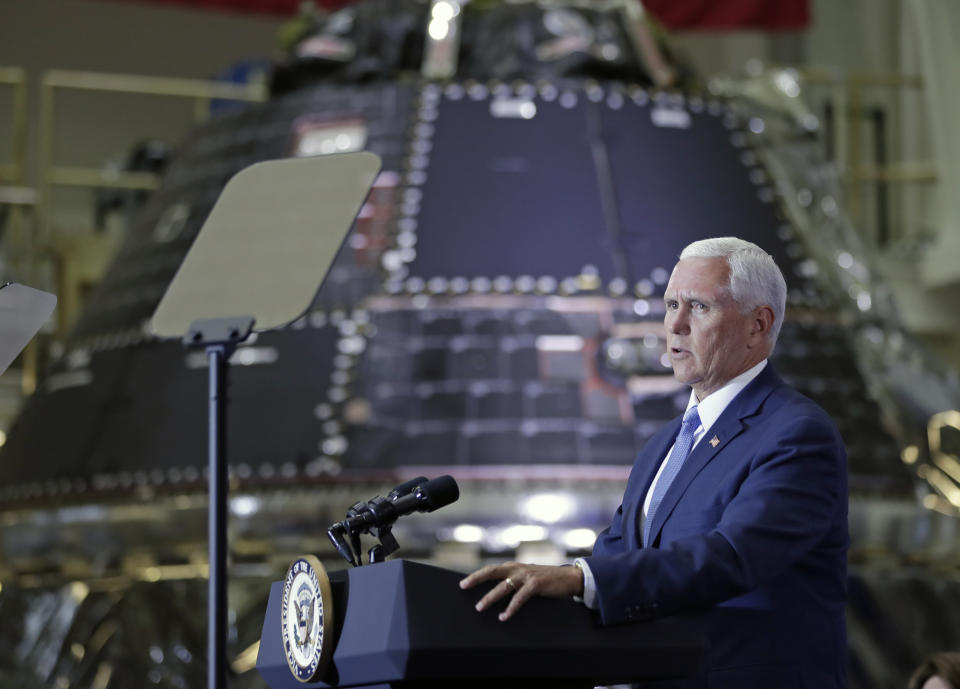 Vice President Mike Pence speaks during an event for employees, their families and supporters at the Kennedy Space Center in recognition of the Apollo 11 anniversary, Saturday, July 20, 2019, in Cape Canaveral, Fla. Behind him is an Orion space capsule that will transport the next humans in space. (AP Photo/John Raoux)