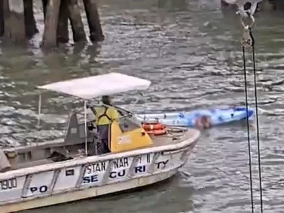 A Cairns Port vessel went to the man's aid after he struggled to get back in his kayak. Picture: 7NEWS