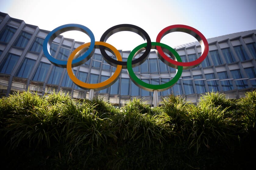 The Olympic Rings logo is pictured in front of the headquarters of the International Olympic Committee (IOC) in Lausanne on March 18, 2020, as doubts increase over whether Tokyo can safely host the summer Games amid the spread of the COVID-19. - Olympic chiefs acknowledged on March 18, 2020 there was no "ideal" solution to staging the Tokyo Olympics amid a backlash from athletes as the deadly coronavirus pandemic swept the globe. The Tokyo Olympics are scheduled to run between July 24 and August 9, 2020. (Photo by Fabrice COFFRINI / AFP) (Photo by FABRICE COFFRINI/AFP via Getty Images)