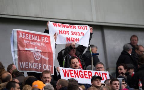 Wenger out banners are displayed - Credit: Getty images