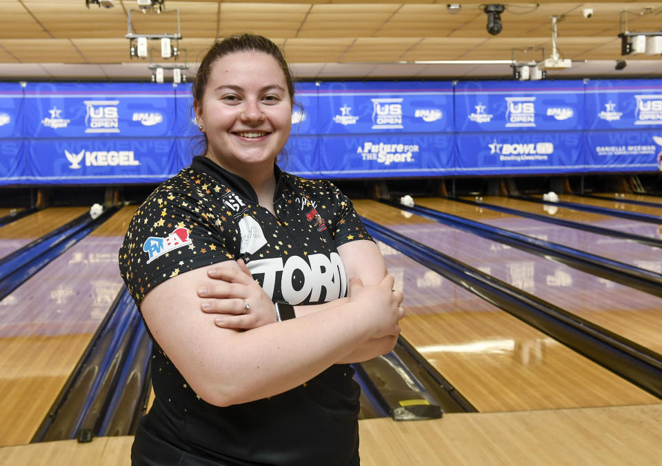 Maria Bulanova, from Russia, poses for a portrait before practice at Kingpin's Alley and Family Center, Wednesday, June 15, 2022, in Glens Falls, N.Y. Title IX has opened the door for thousands of female athletes from abroad to get an American education and a shot at a life and career in the United States. (AP Photo/Hans Pennink)