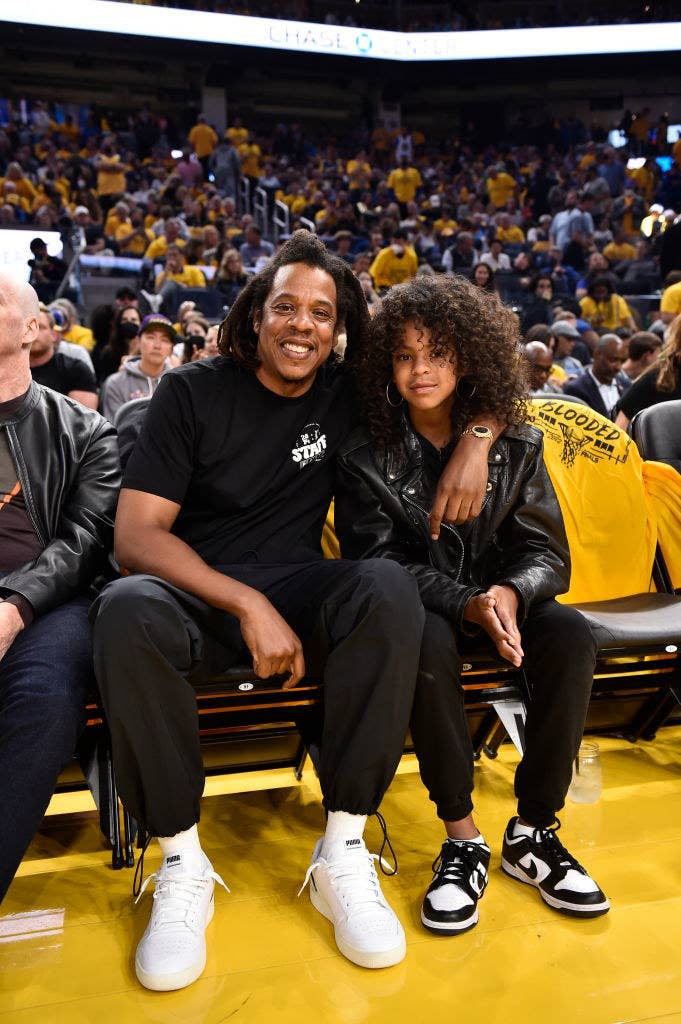 Jay-Z and Blue Ivy at a basketball game