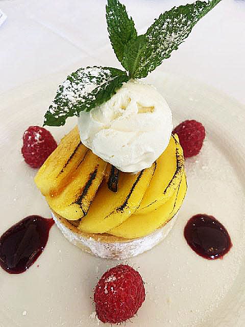 Mango-raspberry tart at Café L'Europe.