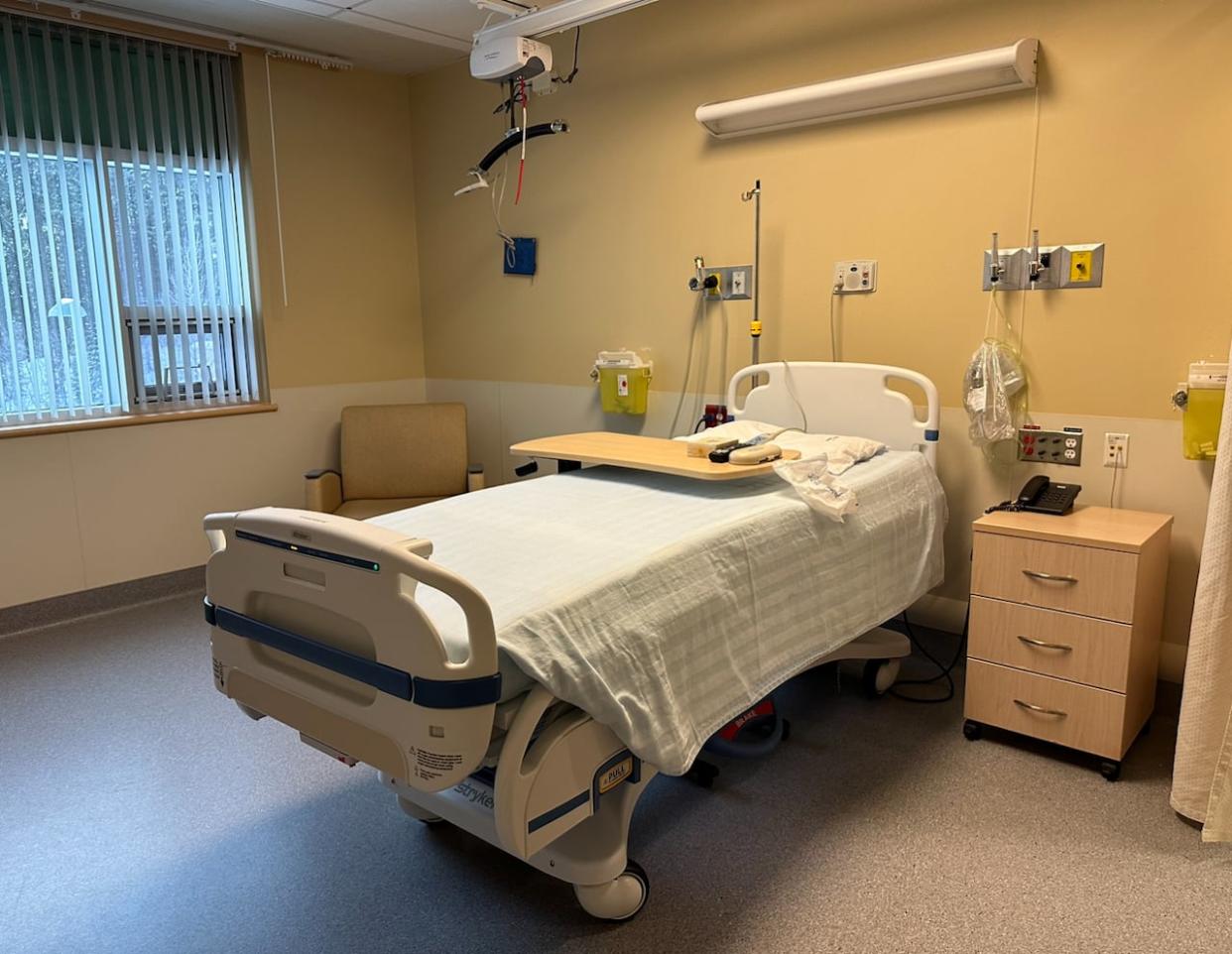 A bed at the Watson Lake hospital. The room was refurbished to accommodate patients requiring long-term care, before the territorial government put the plan on pause late last year. The health minister says the project is now back on track. (Cheryl Kawaja/CBC - image credit)