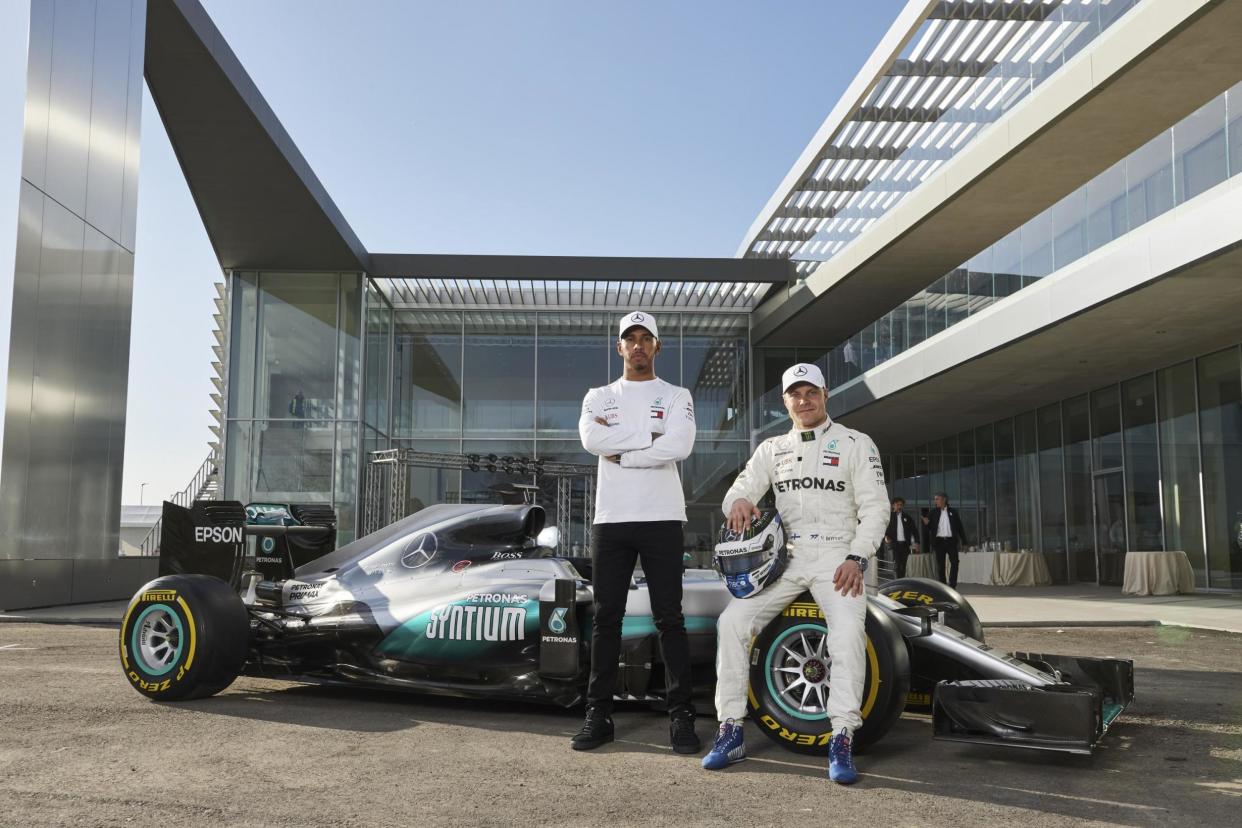 Team-mates | Hamilton and Bottas pose with their Mercedes: Getty Images for Mercedes-AMG PE