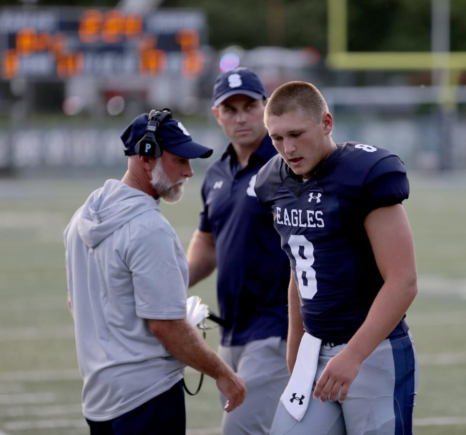 Middletown South QB Jake Czwakiel walks off the field after being injured early in the game against Rumson-Fair Haven at home Friday evening, August 25, 2023.