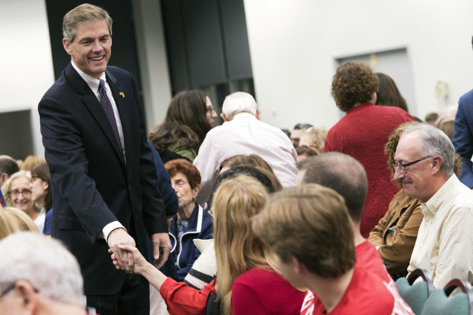 Republican Assemblyman Jay Webber greets voters during a candidate forum at the UJC of MetroWest New Jersey, Tuesday, Oct. 9, 2018, in Whippany, N.J. (AP Photo/Mary Altaffer)