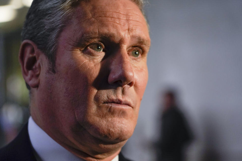 FILE - Britain's Labour Party leader Keir Starmer speaks to the media as he leaves the BBC studios, in London, Sunday, Oct. 23, 2022. (AP Photo/Alberto Pezzali, File)