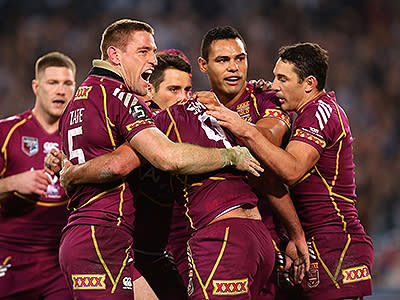 The Maroons celebrate Boyd's try.