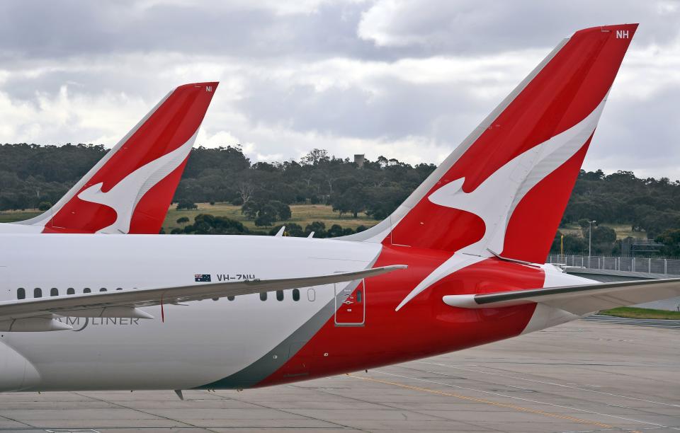 Two Qantas planes are seen at at Melbourne Airport on August 20, 2020. - Australian flag carrier Qantas on August 20, 2020 posted an almost 2 billion USD annual loss after a "near-total collapse" in demand due to the COVID-19 coronavirus pandemic. (Photo by William WEST / AFP) (Photo by WILLIAM WEST/AFP via Getty Images)