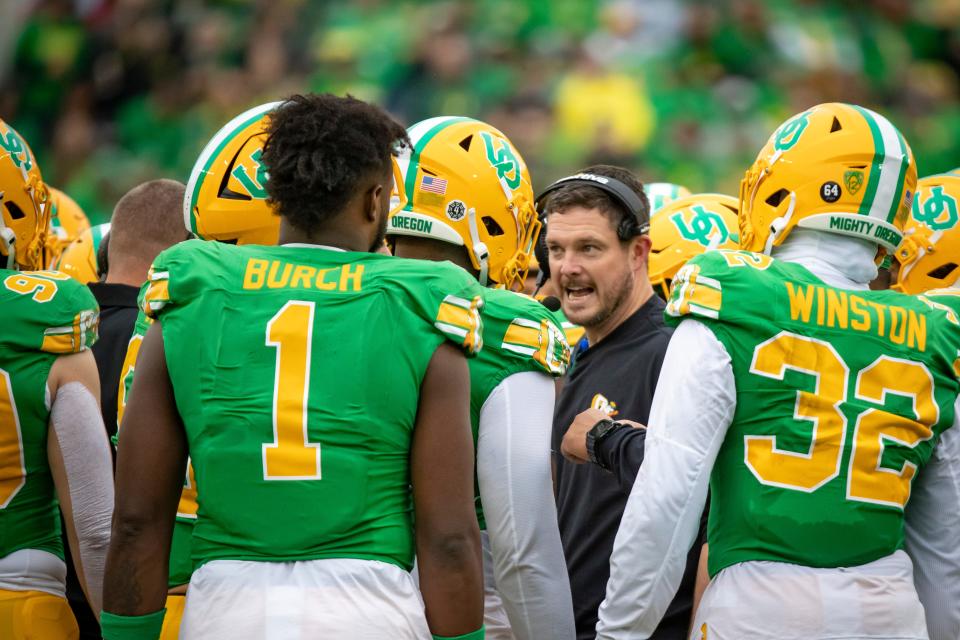 Oregon head coach Dan Lanning talks to his team as the No. 9 Oregon Ducks host Washington State Saturday, Oct. 21, 2023, at Autzen Stadium in Eugene, Ore.