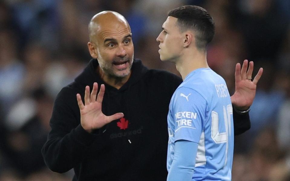 Pep Guardiola and Phil Foden - Pep Guardiola prepares to shift Phil Foden into central midfield - Lee Smith