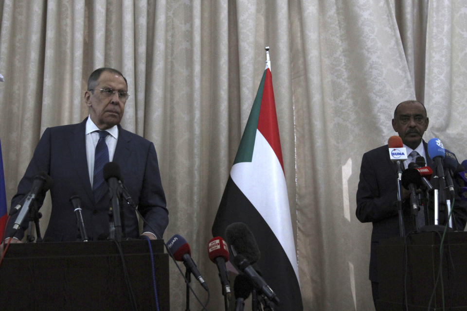 Russian Foreign Minister Sergei Lavrov, left, and Sudanese acting foreign minister Ali al-Sadiq give a joint press conference at the airport in Khartoum, Sudan, Thursday, Feb. 9, 2023. (AP Photo/Marwan Ali)