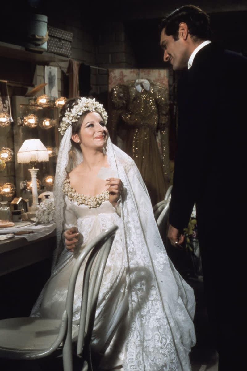 <p>We didn't <em>technically</em> see what Fanny Brice wore to say "I do" to the dashing Nick Arnstein, but Barbra Streisand was wearing an absolutely gorgeous wedding gown for her performance with the Ziegfeld Follies when the two characters fell in love.<br></p>