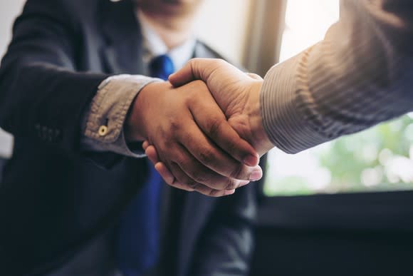 Businessmen shaking hands.