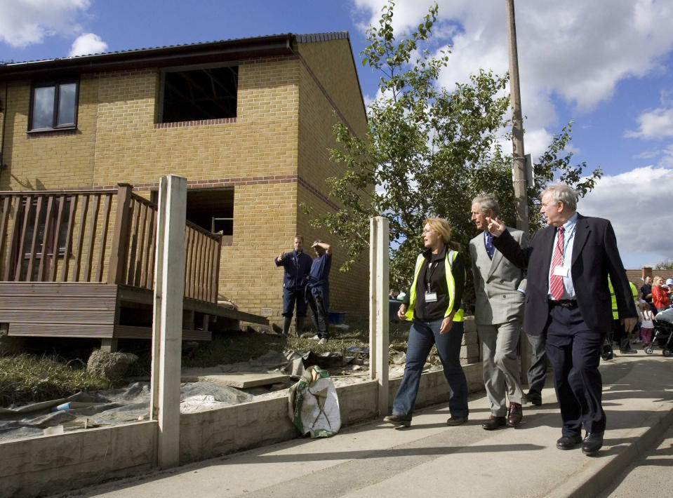 Prince Charles, Prince of Wales visits the village of Carcliffe in South Yorkshire to meet emergency service personnel and residents affected by the recent floods brought on by heavy rains.