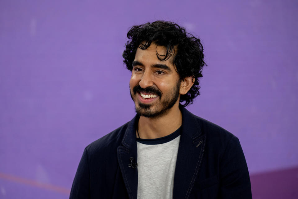 Closeup of Dev Patel smiling