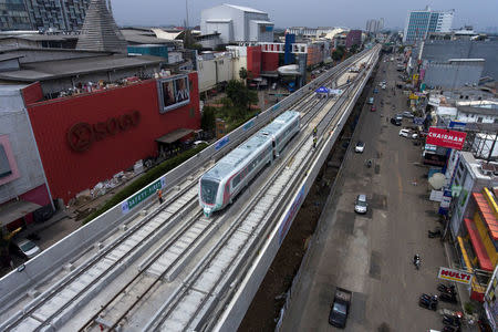 An aerial view of the new train of Light Rail Transit (LRT) on the Kelapa Gading section in Jakarta, Indonesia, April 15, 2018. Antara Foto/Sigid Kurniawan/via REUTERS