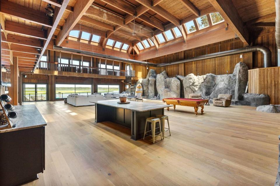 Built in 1987 the home at 15 Cedar Lane in Moss Creek has wood finishes that are completely custom for the construction of this 12,000-square foot home.