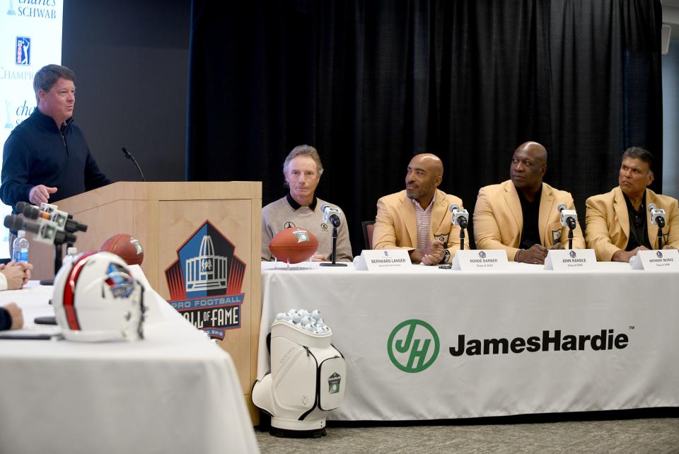 PGA Tour Champions President Miller Brady speaks Jan. 23, 2024, at The Pro Football Hall of Fame as Bernhard Langer, Ronde Barber, John Randle and Anthony Munoz listen during the announcement of The James Hardie Pro Football Hall of Fame Invitational.