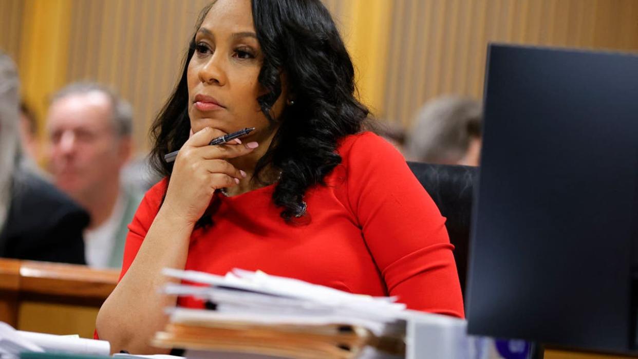 <div>ATLANTA, GA - MARCH 01: Fulton County District Attorney Fani Willis looks on during a hearing in the case of the State of Georgia v. Donald John Trump at the Fulton County Courthouse on March 1, 2024, in Atlanta, Georgia. The hearing is to determine whether Fulton County District Attorney Fani Willis should be removed from the case because of a relationship with Nathan Wade, special prosecutor she hired in the election interference case against former President Donald Trump. (Photo by Alex Slitz-Pool/Getty Images)</div>