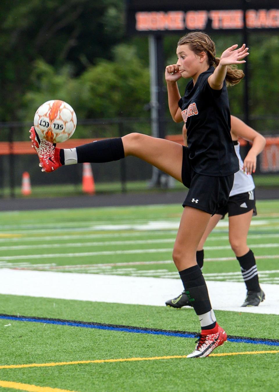 Jessica Perry makes a spectacular stop on a pass near the sideline.