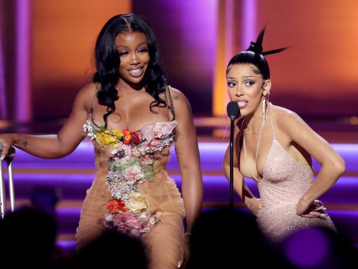 SZA and Doja Cat on stage at the 2022 Grammys.