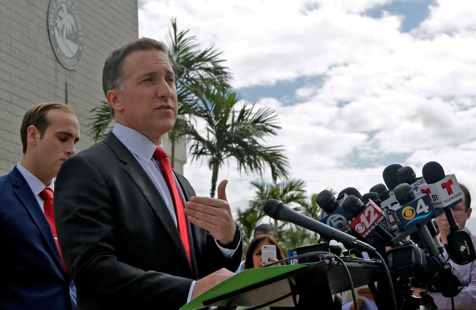 Palm Beach County State attorney Dave Aronberg talks to reporters during a news conference outside the Palm Beach County courthouse, Friday, Oct. 27, 2017, in Palm Beach Gardens, Fla. Golfer Tiger Woods pleaded guilty to reckless driving and agreed to enter a diversion program Friday, five months after he was found passed out in his Mercedes with prescription drugs and marijuana in his system.  (AP Photo/Alan Diaz)