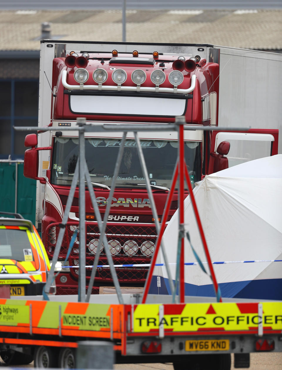 Police activity at the Waterglade Industrial Park in Grays, Essex, after 39 bodies were found inside a lorry container on the industrial estate.