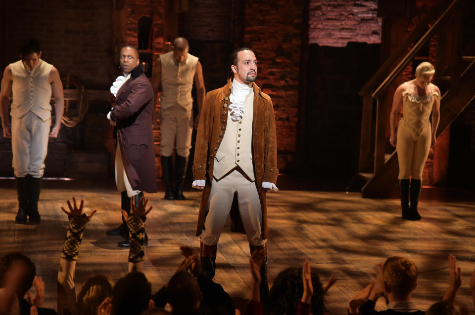 NEW YORK, NY - FEBRUARY 15:  Actor Leslie Odom, Jr. (L)  and actor, composer Lin-Manuel Miranda (R) and cast of 'Hamilton' perform on stage during 'Hamilton' GRAMMY performance for The 58th GRAMMY Awards at Richard Rodgers Theater on February 15, 2016 in New York City.  (Photo by Theo Wargo/WireImage)