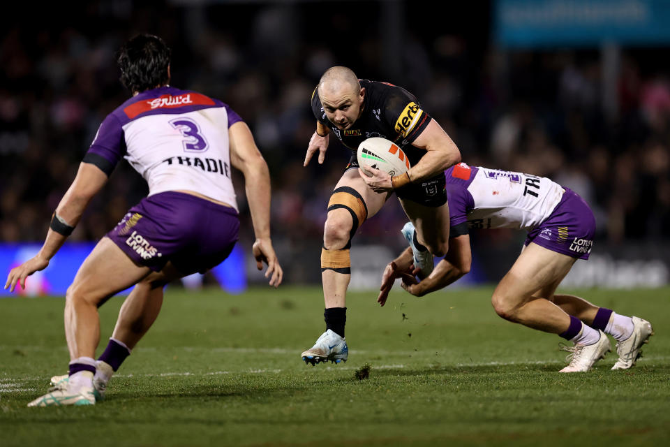 PENRITH, AUSTRALIA - AUGUST 15: Dylan Edwards of the Panthers runs the ball  during the round 24 NRL match between Penrith Panthers and Melbourne Storm at BlueBet Stadium, on August 15, 2024, in Penrith, Australia. (Photo by Brendon Thorne/Getty Images)