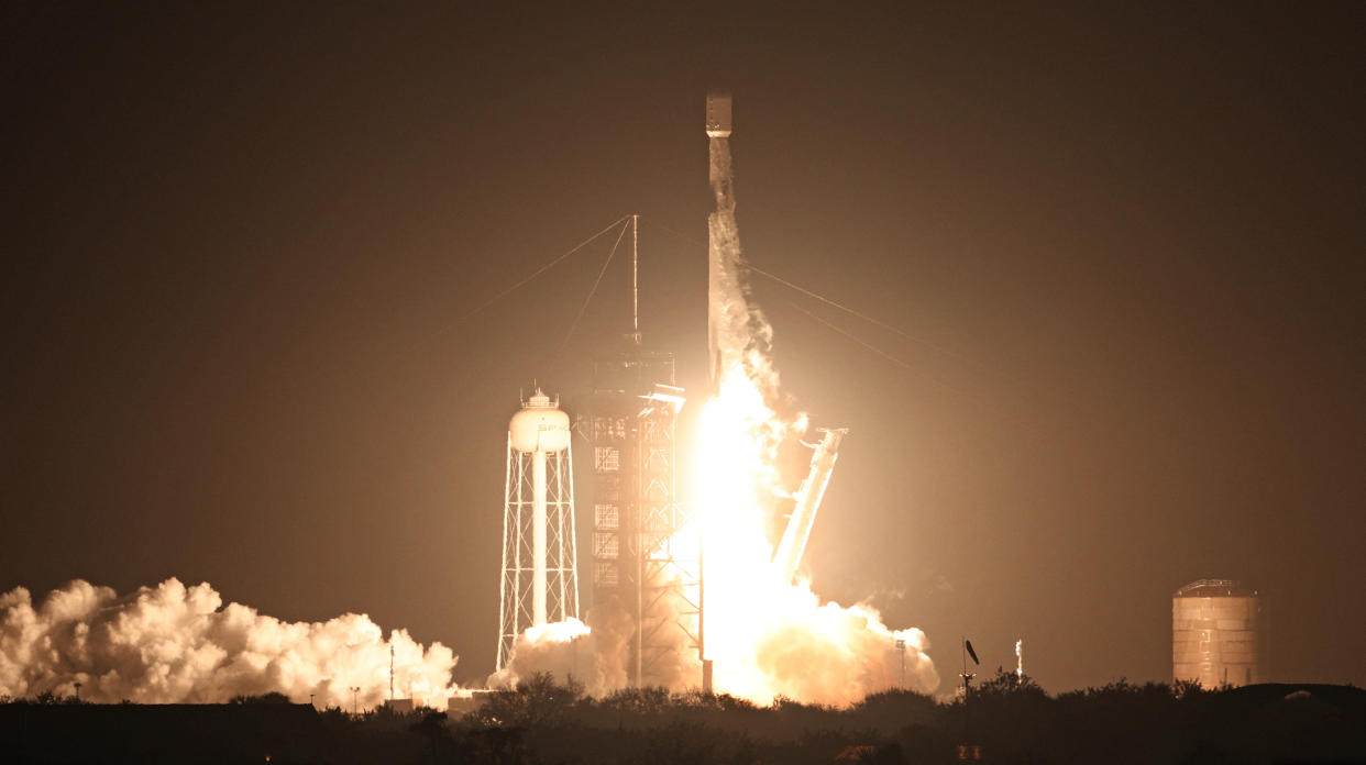 A SpaceX Falcon 9 rocket lifts off from launch pad LC-39A at the Kennedy Space Center with the Intuitive Machines' Nova-C moon lander mission, in Cape Canaveral, Florida, on February 15, 2024. The IM-1 mission is part of NASA's Commercial Lunar Payload Services (CLPS) program to understand more about the Moon's surface ahead of the coming Artemis missions. Intuitive Machines' Odysseus lander would be the first US spacecraft to land on the moon in over 50 years. It is expected to land near the south pole of the moon on February 22. (Photo by Gregg Newton / AFP) (Photo by GREGG NEWTON/AFP via Getty Images)