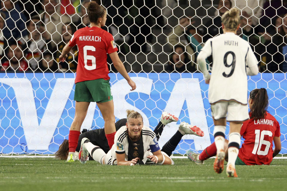 Germany's Alexandra Popp, center, reacts after scoring her side's second goal during the Women's World Cup Group H soccer match between Germany and Morocco in Melbourne, Australia, Monday, July 24, 2023. (AP Photo/Hamish Blair)