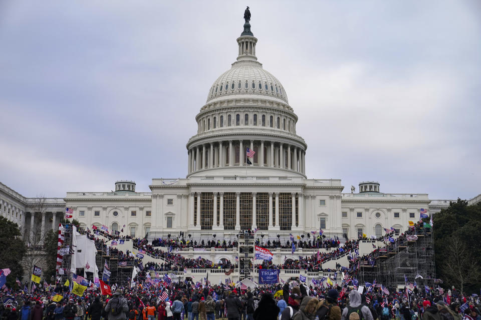 FILE - In this Jan. 6, 2021, file photo insurrections loyal to President Donald Trump riot outside the Capitol in Washington. The House panel investigation of the riot at the U.S. Capitol issued sweeping document requests on Friday, Aug. 27, to social media companies, expanding the committee’s investigation as it seeks to examine the events leading to January’s insurrection. (AP Photo/John Minchillo, File)